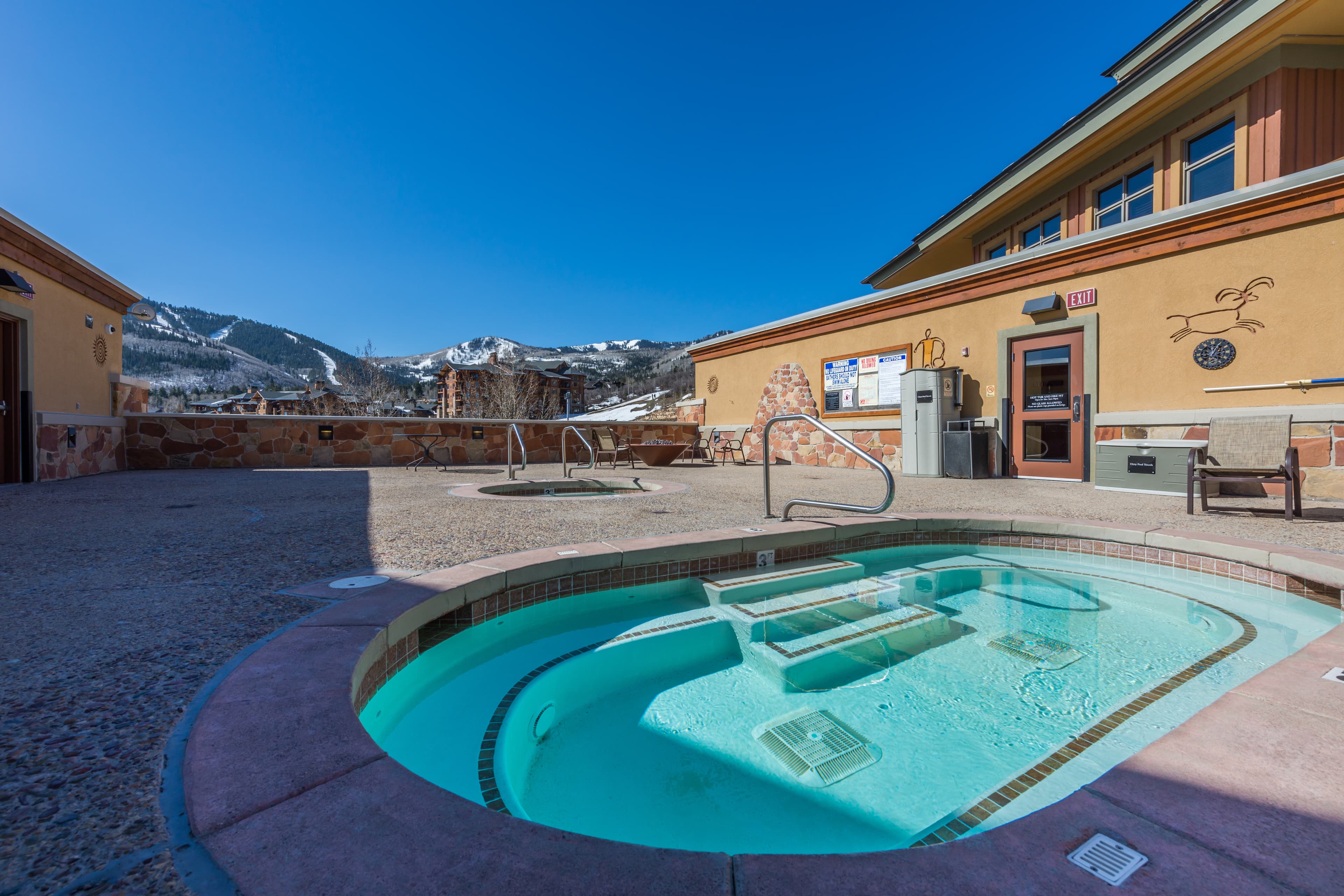 Rooftop hot tub, one of two hot tubs on property