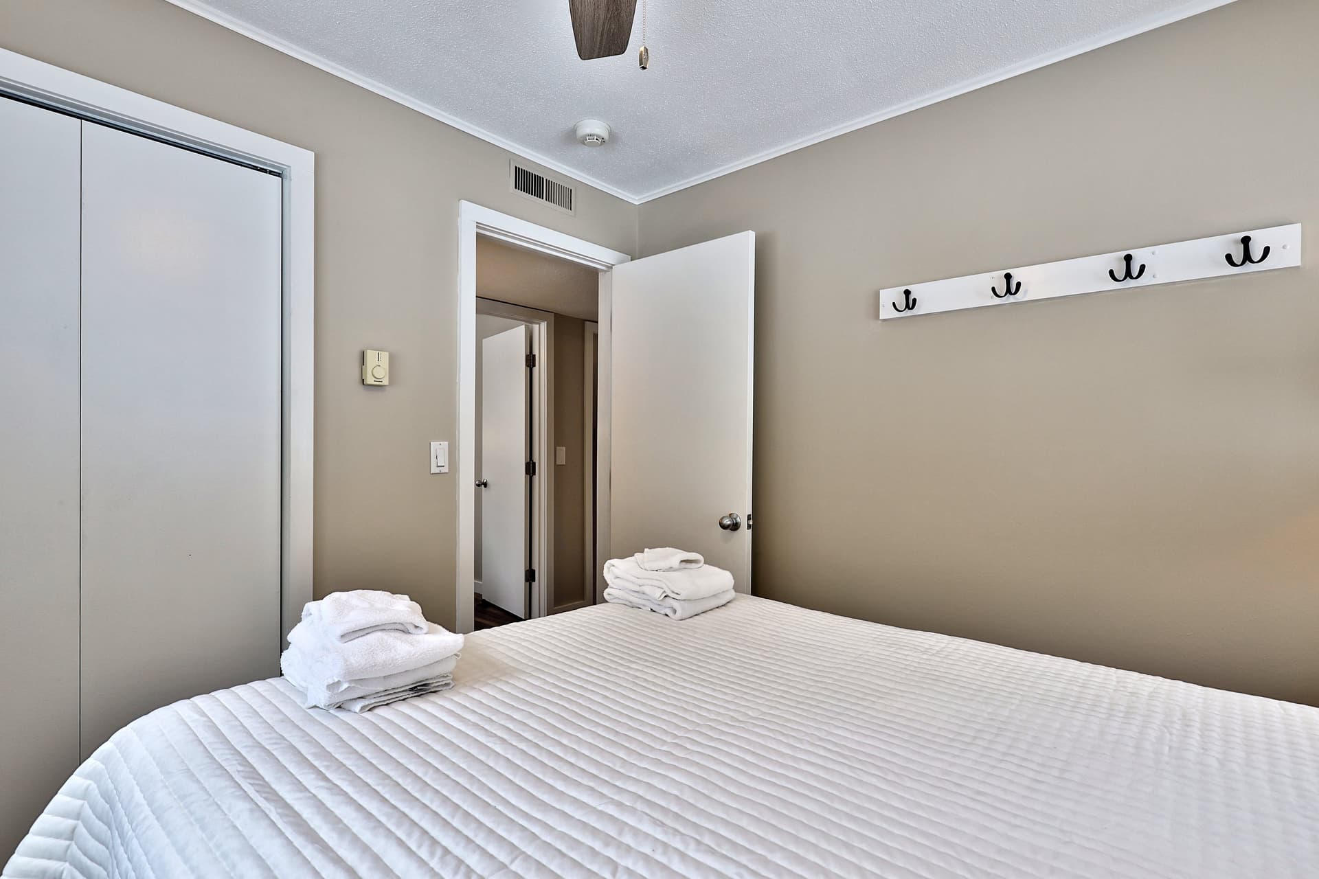 Queen bedroom.  Hooks and a closet provides plenty of storage space.
