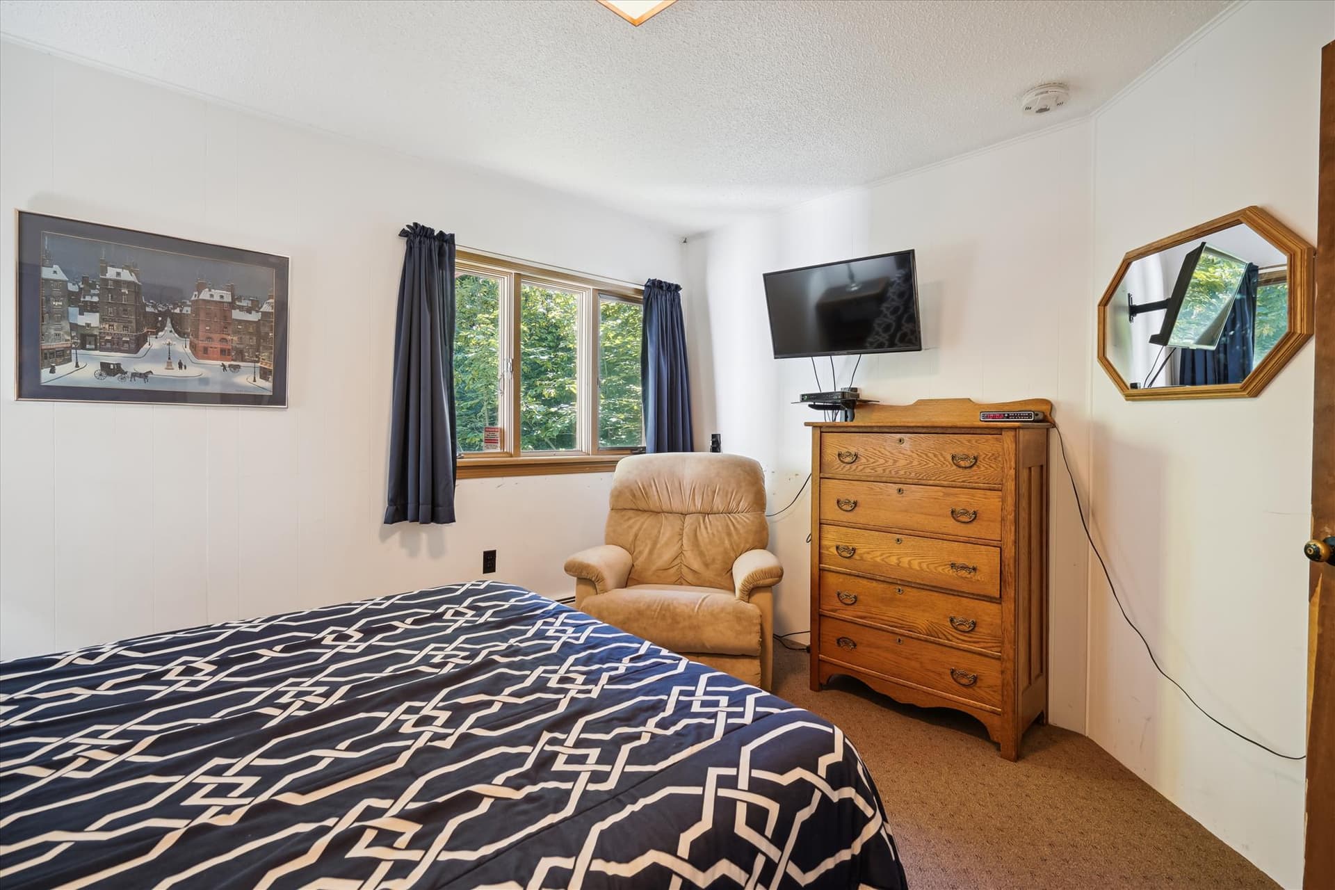 Lay in bed and enjoy the flat screen tv.