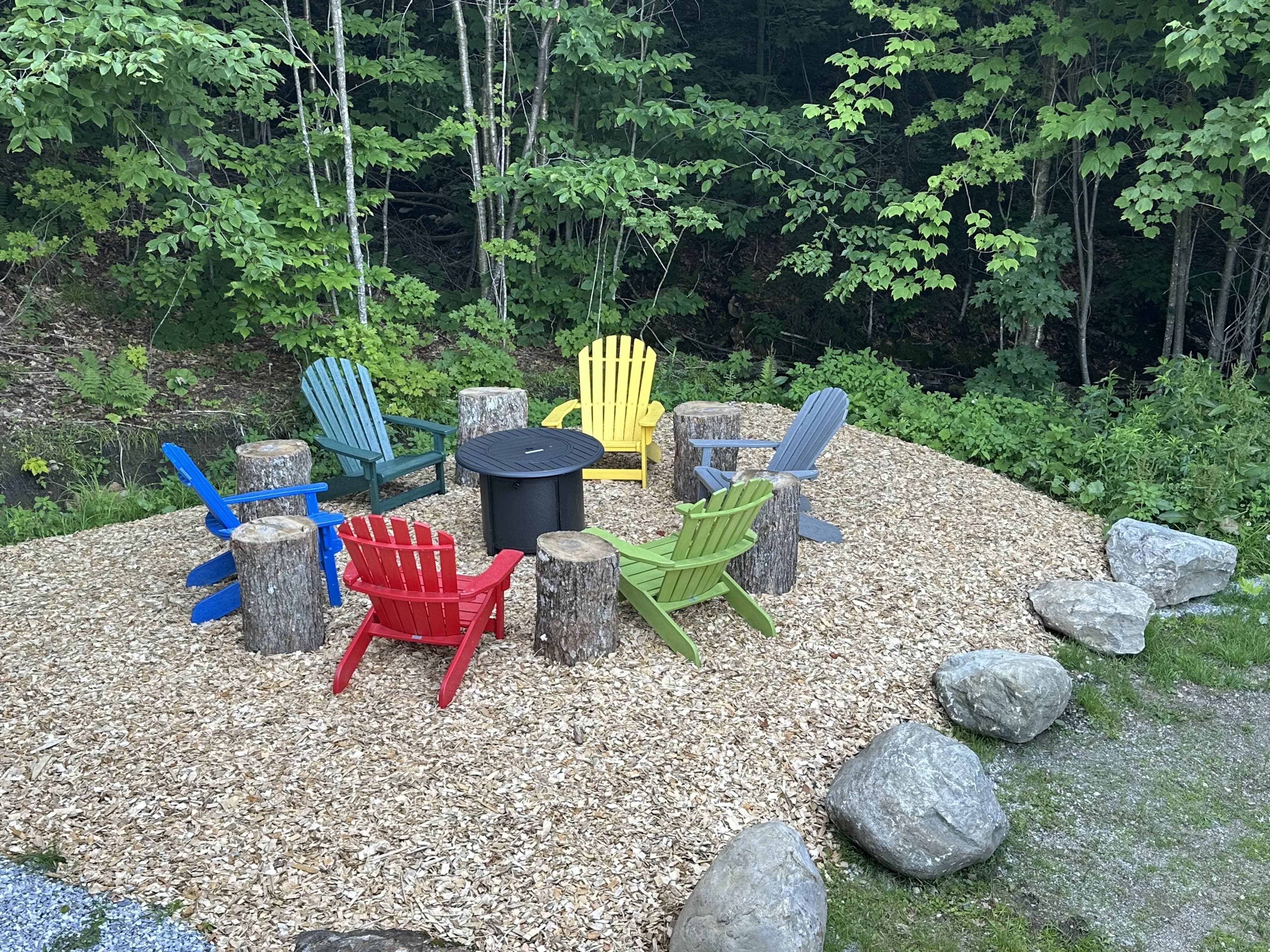 Fire pit and Adirondack chairs for you to fully relax in fresh mountain air.