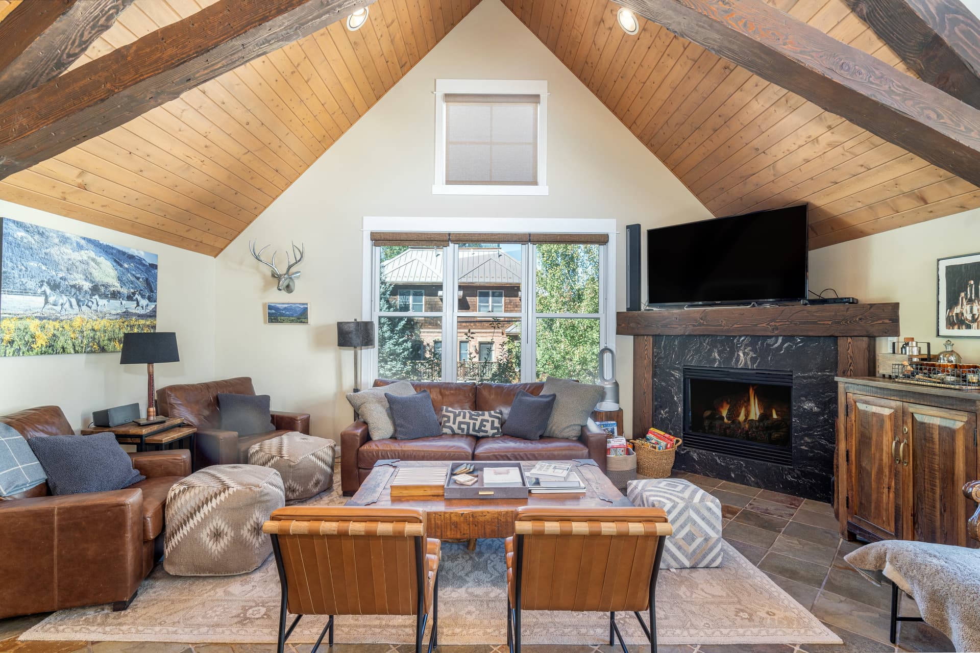 Such a cozy gathering spot in the great room with a fireplace.