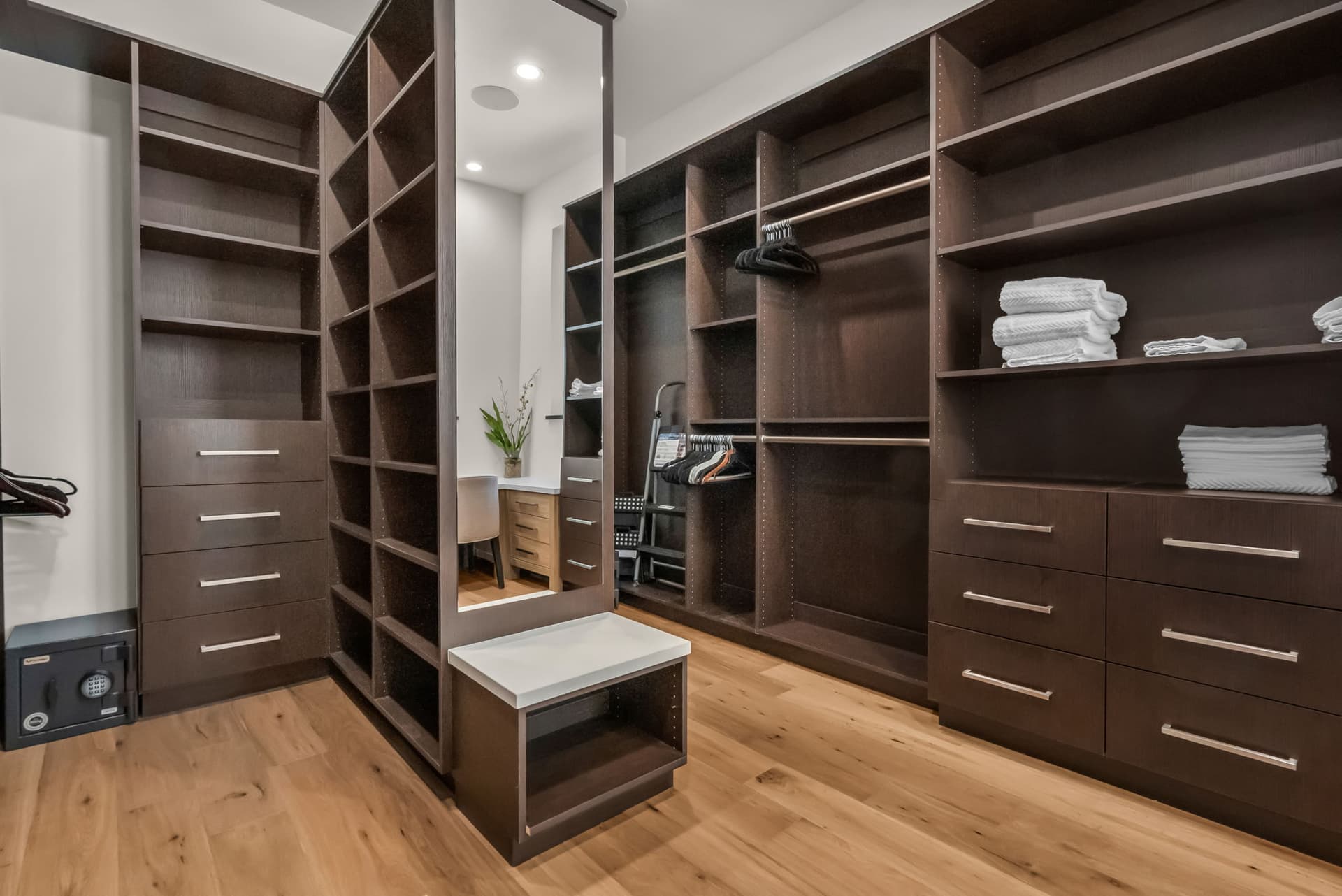 Walk-in Closet with Wall-Mounted Cabinets, Shelf, and Drawers