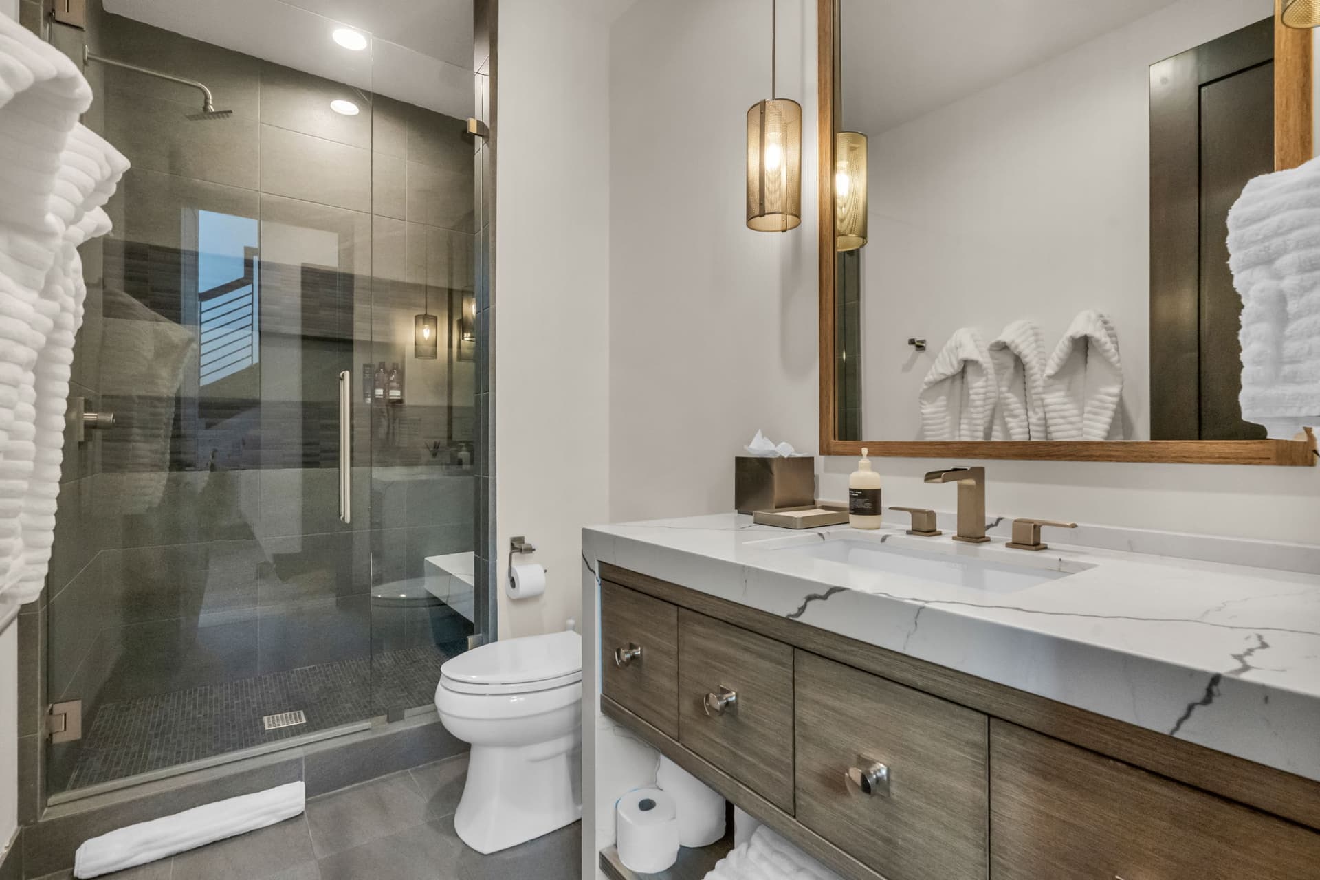 Walk-in Shower with Glass Door, Single Sink Bath Vanity and Mirror