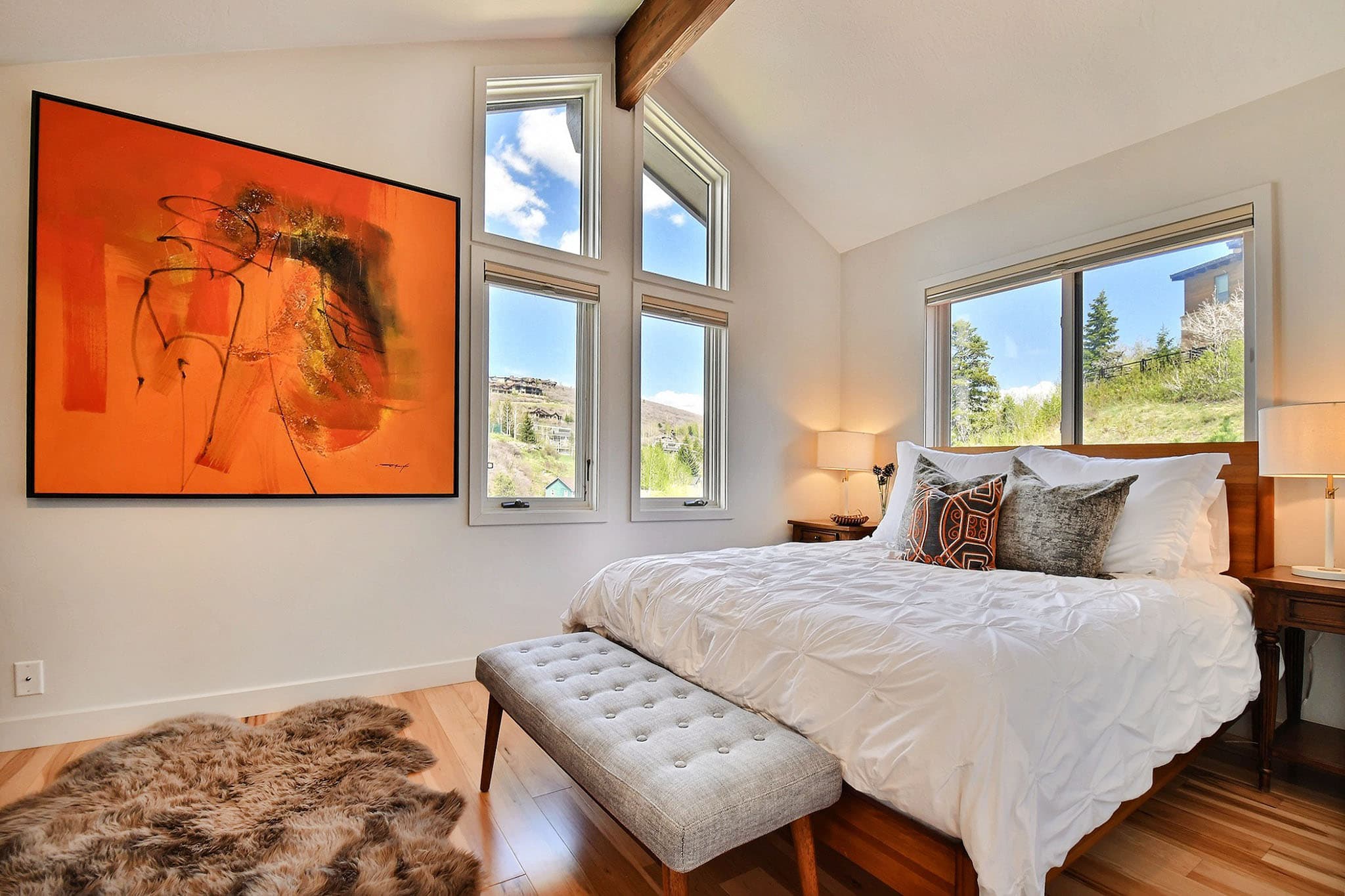Bedroom with a Bed for Two, Chaise Lounge, and Painting