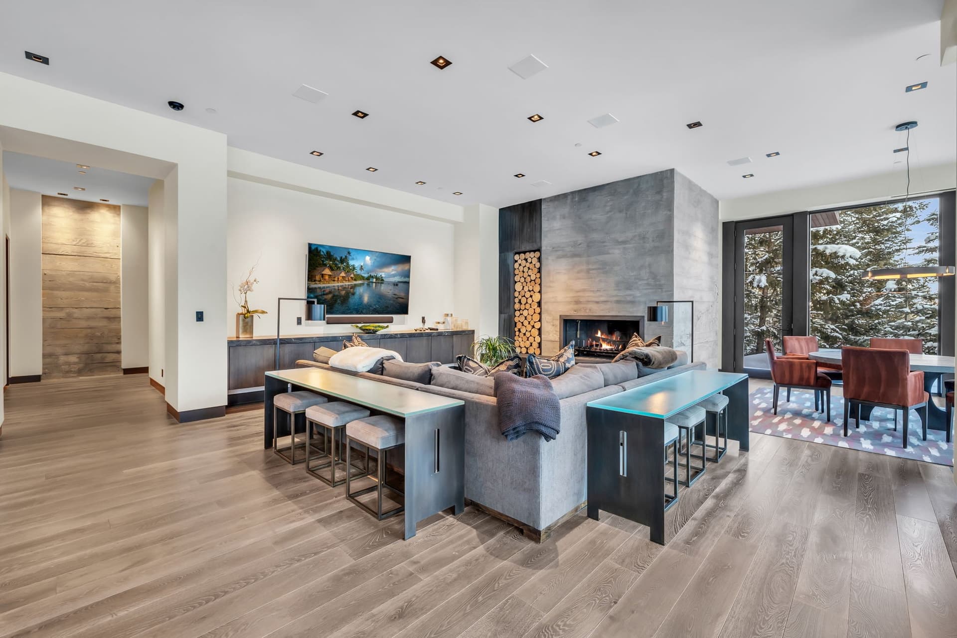 A chic  lounge with a modern fireplace and open design.