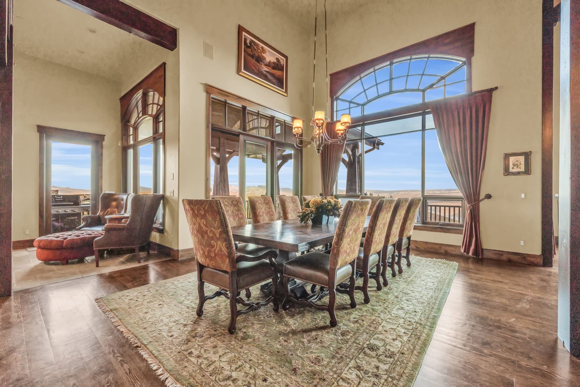 Morning Star dining room with chandelier, long table, and external views.