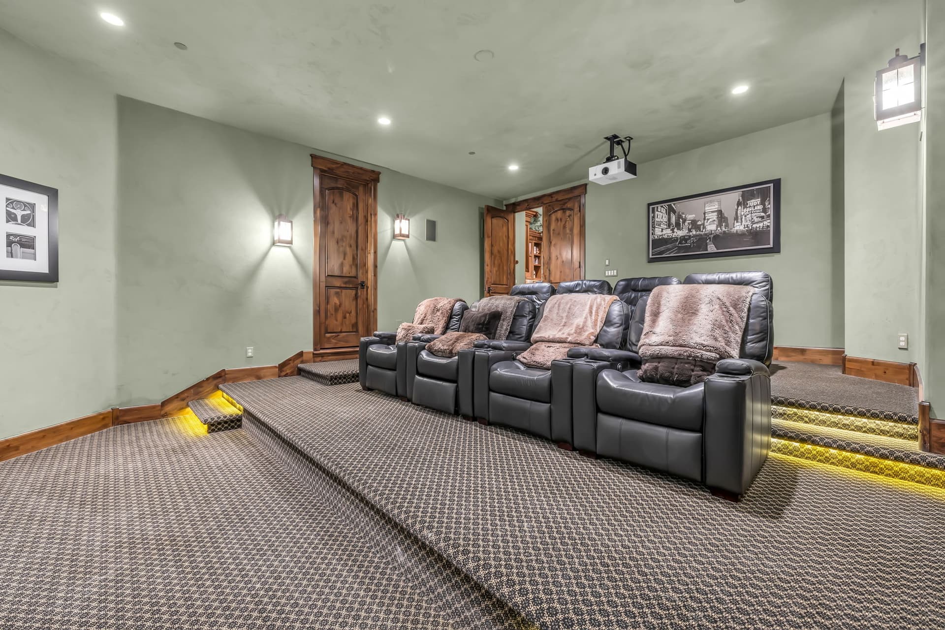 Game room with lounge chairs and projector, Luxury Park City vacation rentals.