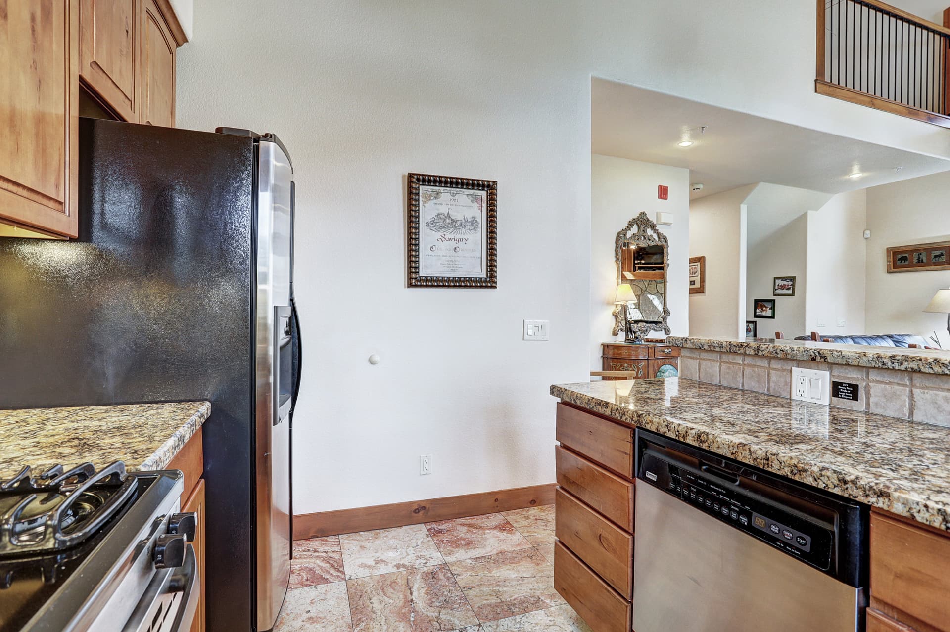 Store all of the food and stacks you need in this large stainless steel fridge - Amber Sky Breckenridge Vacation Rental