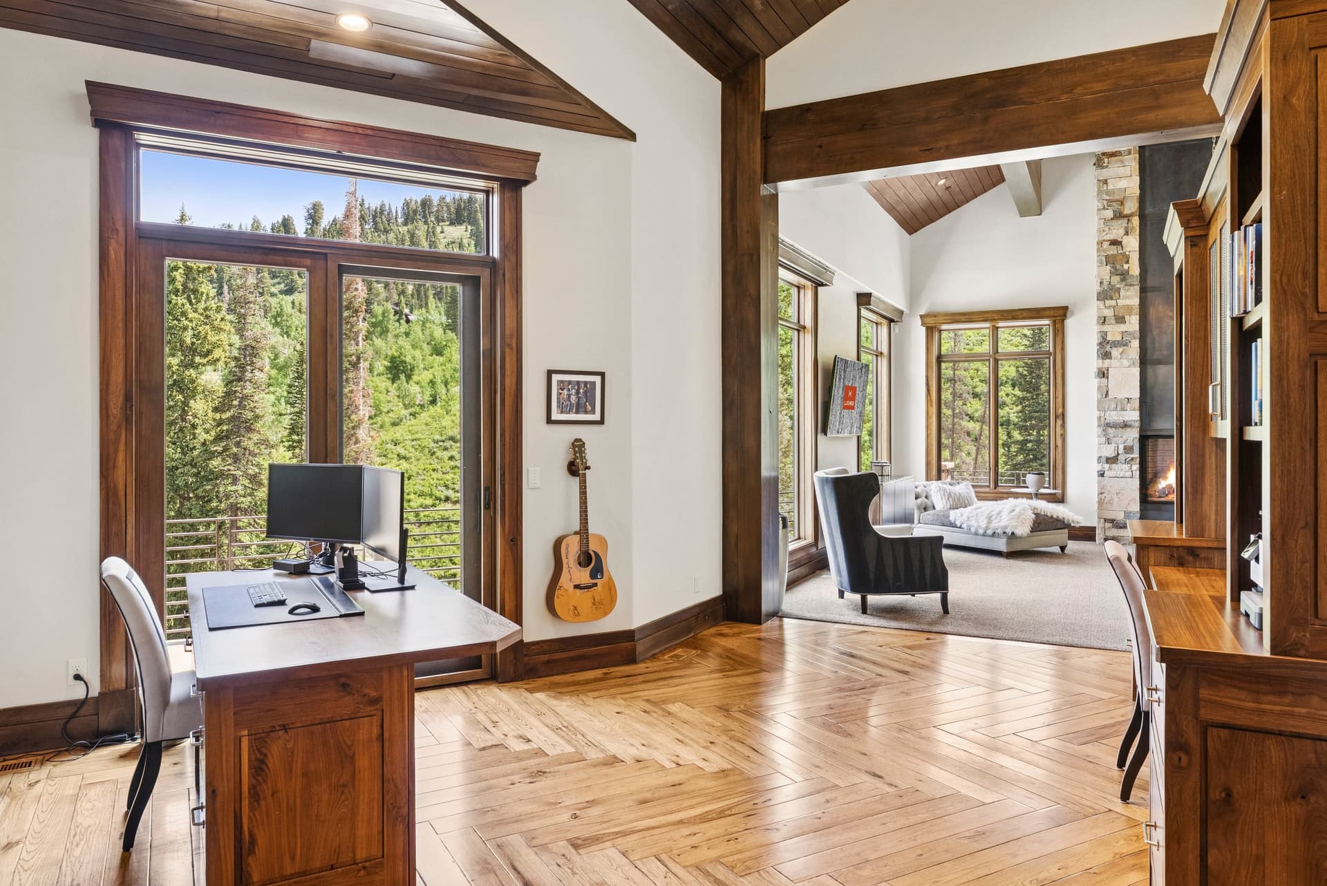 office with large windows and mountain vie