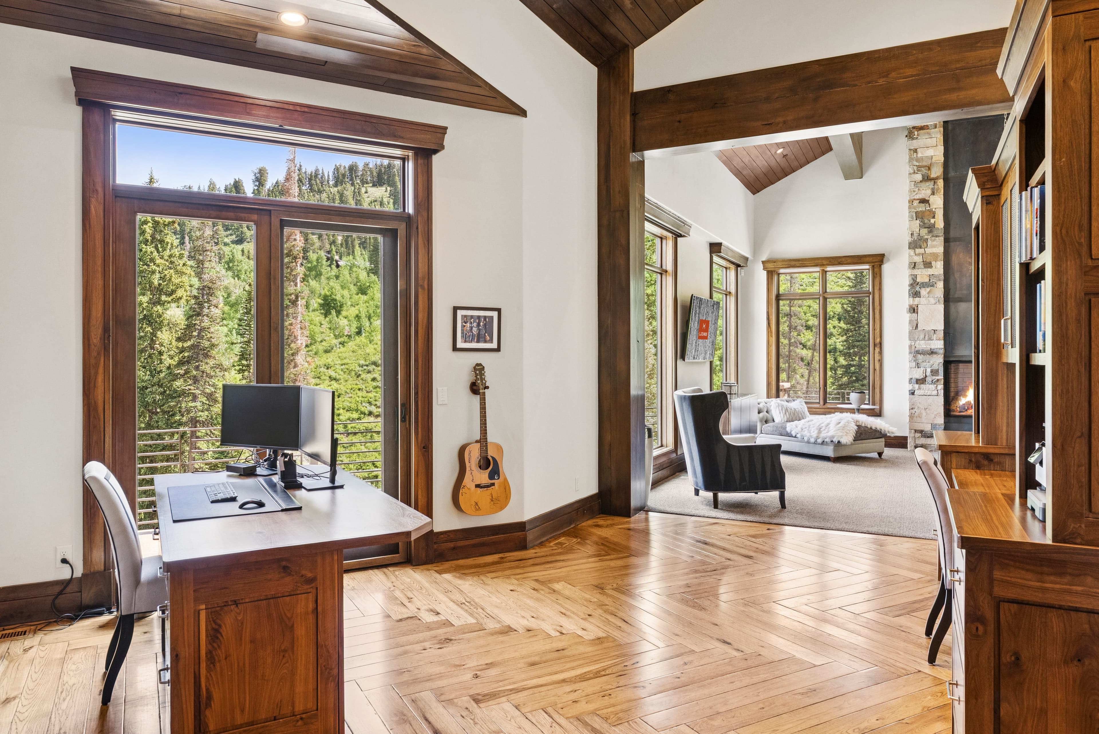 office with large windows and mountain vie
