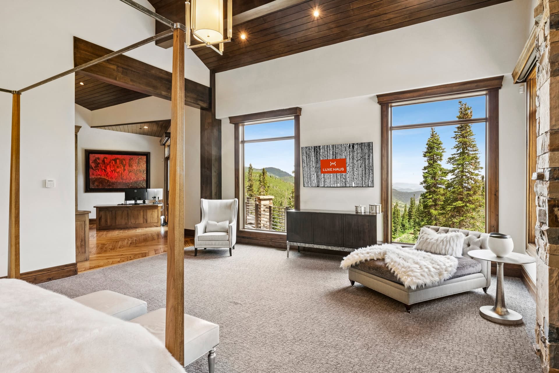 view of windows and tv in primary suite