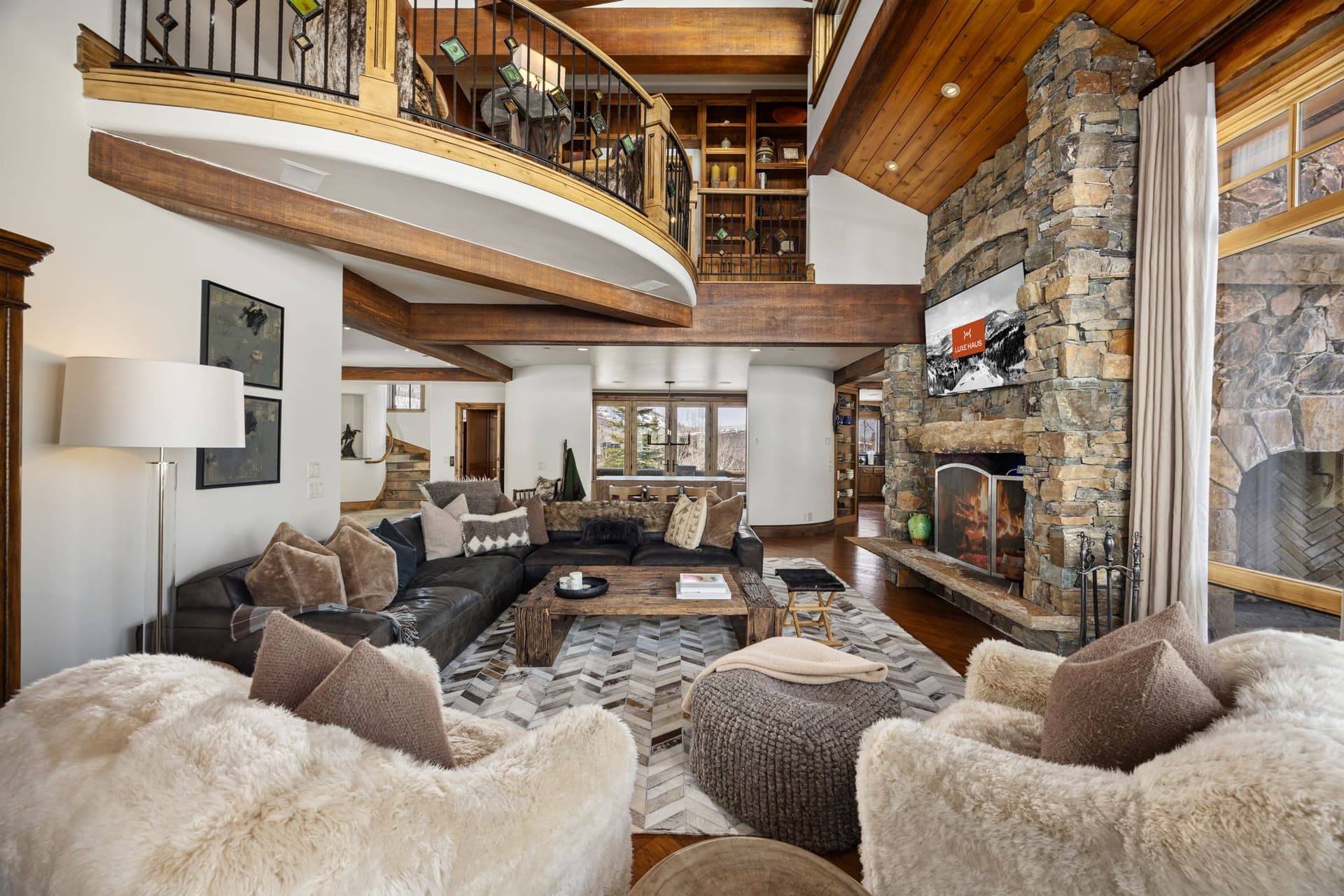 a view of the living room and second floor balcony