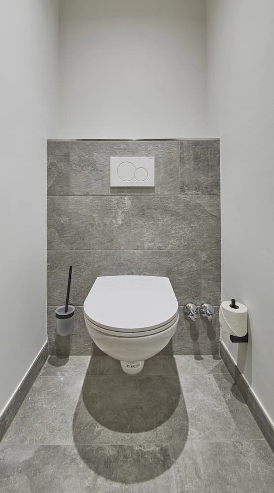 Raised toilet seat